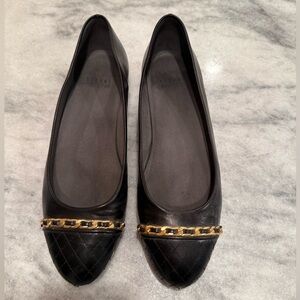Stuart Weitzman Black Leather Flats with Gold Chain Detail